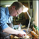 Tobias Berg gluing a bridge o n